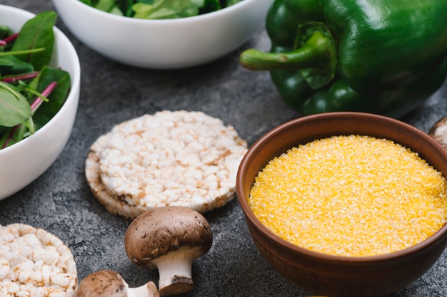 yellow-polenta-bowl-puffed-rice-cake-mushroom-bell-pepper-23-2148062421